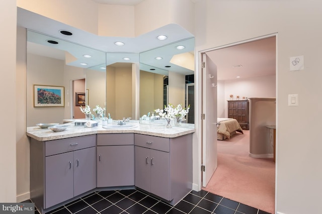 bathroom with vanity and tile patterned flooring