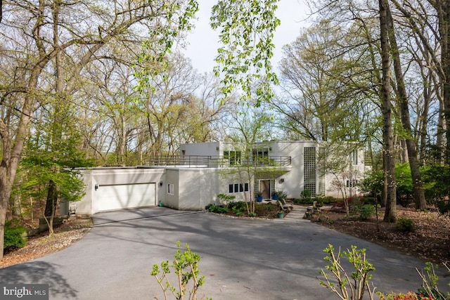 view of front of home with a garage