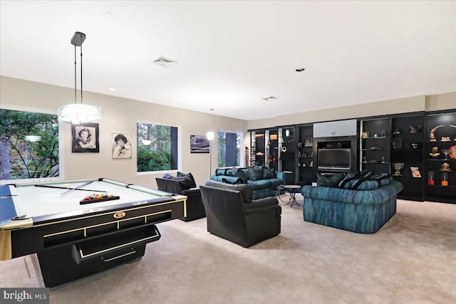 carpeted living room featuring pool table