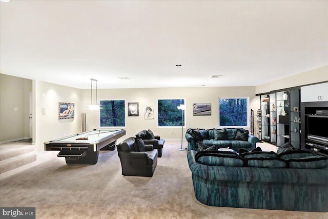 carpeted living room featuring pool table