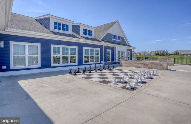 rear view of property featuring a patio