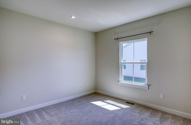 view of carpeted spare room