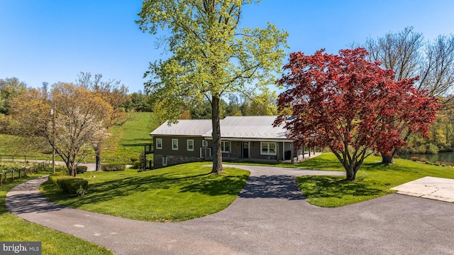 view of front of house with a front lawn