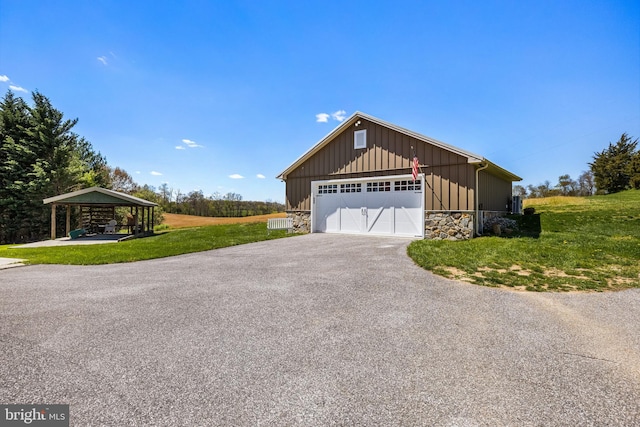 garage with a lawn