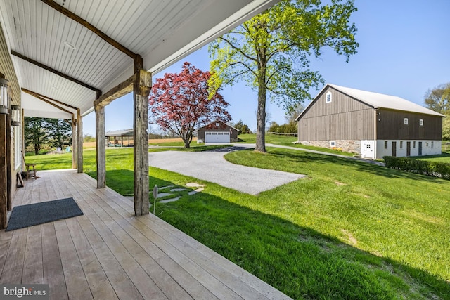 exterior space with an outdoor structure and a garage