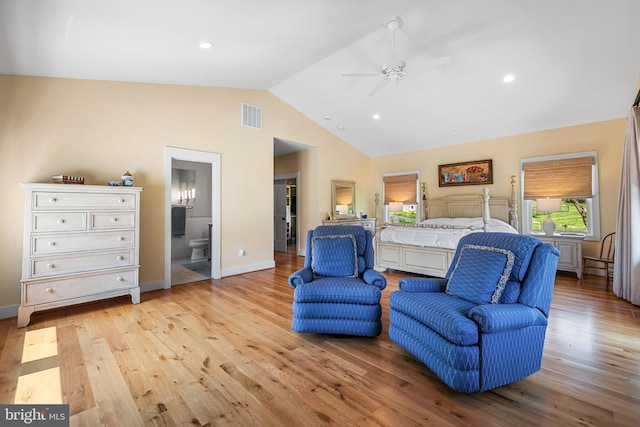 living room featuring high vaulted ceiling, ceiling fan, and light wood-type flooring