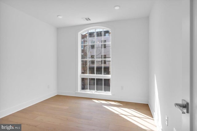 empty room with light wood-type flooring