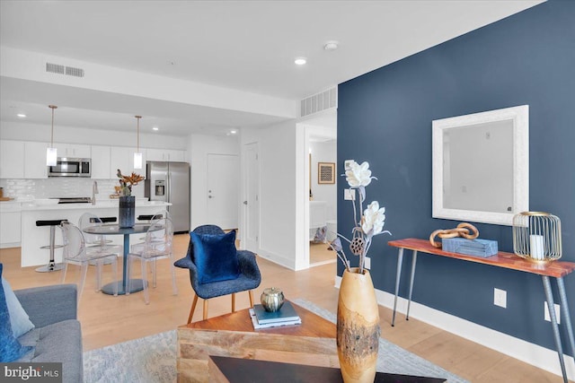 living room with light wood-type flooring