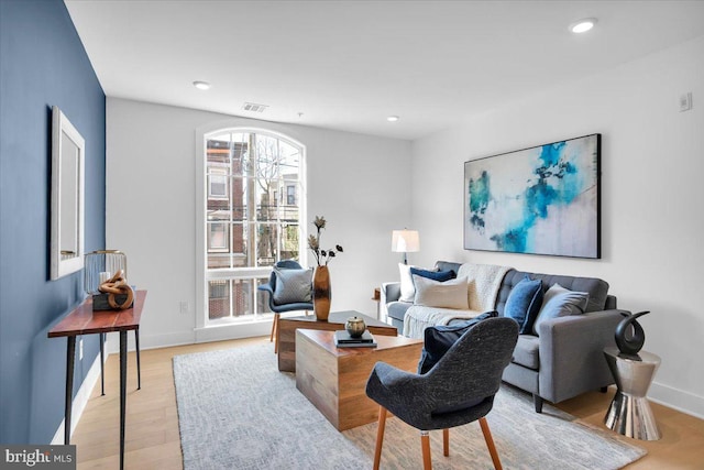 living room featuring light wood-type flooring