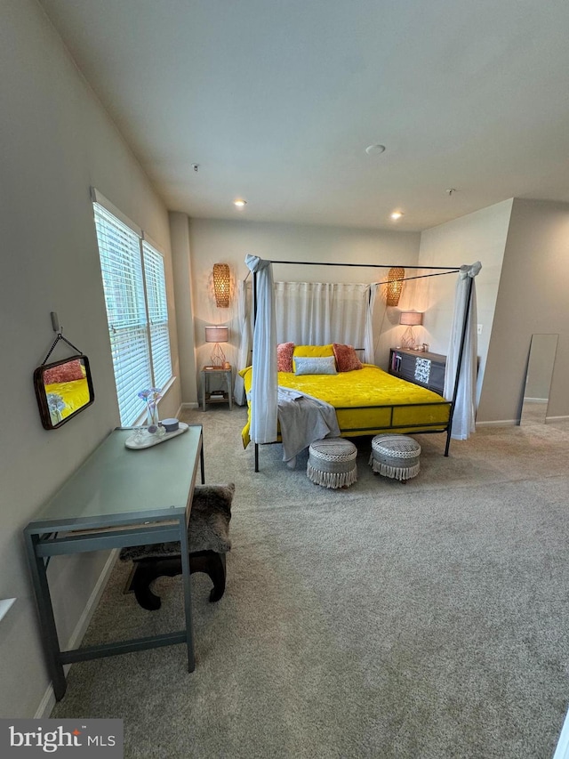 carpeted bedroom featuring recessed lighting and baseboards