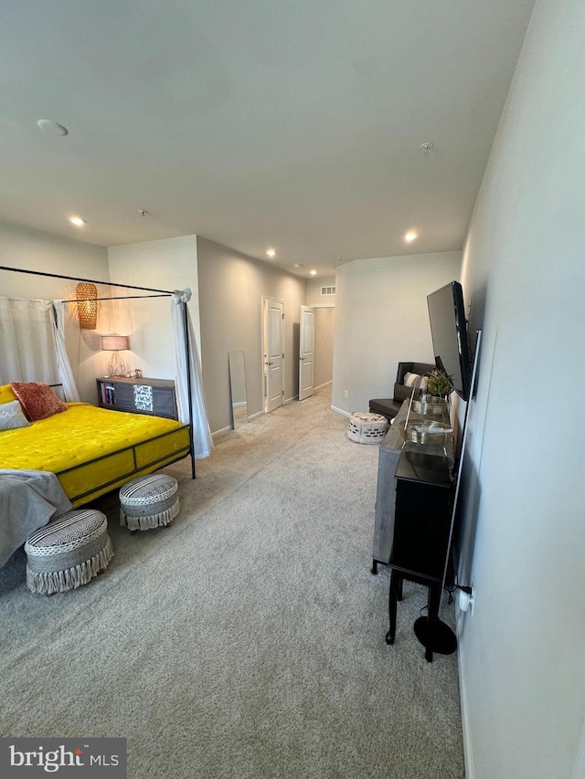 bedroom with recessed lighting, baseboards, and carpet flooring