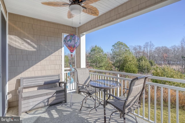 wooden terrace with ceiling fan