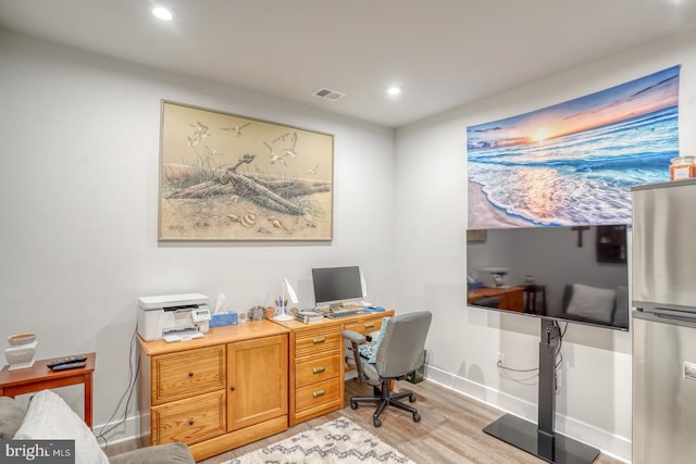 home office featuring light hardwood / wood-style floors