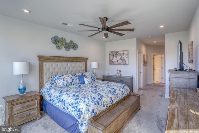 carpeted bedroom with ceiling fan