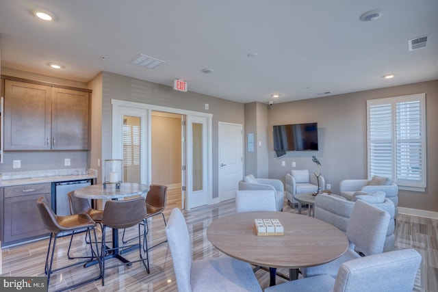 dining room featuring light hardwood / wood-style flooring