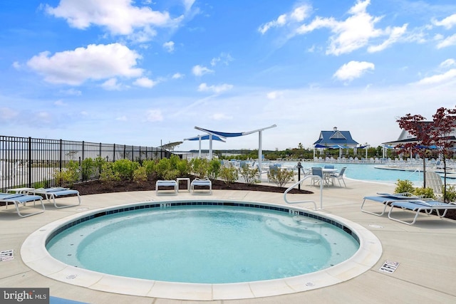 view of pool featuring a patio area