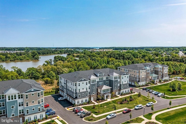 drone / aerial view with a water view