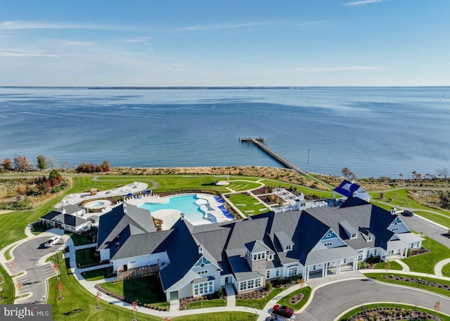 drone / aerial view with a water view