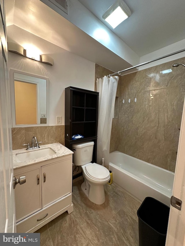 full bathroom with tile flooring, oversized vanity, toilet, and shower / bath combo with shower curtain