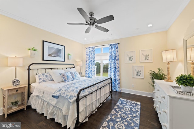 bedroom with ceiling fan, dark hardwood / wood-style flooring, and crown molding