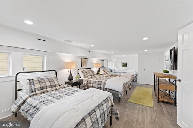 bedroom with light hardwood / wood-style flooring