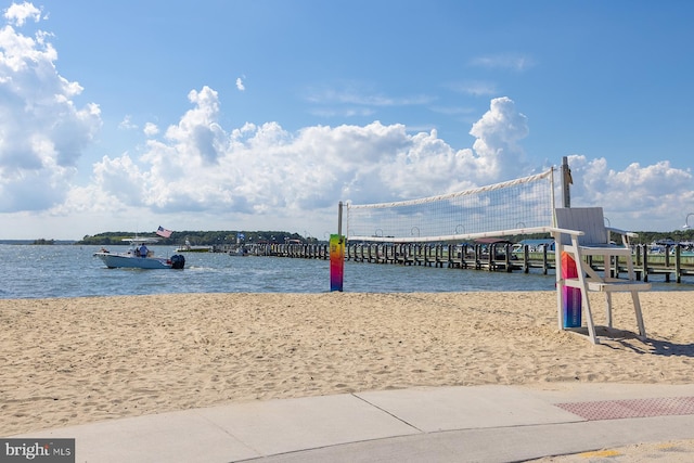 view of nearby features featuring volleyball court and a water view