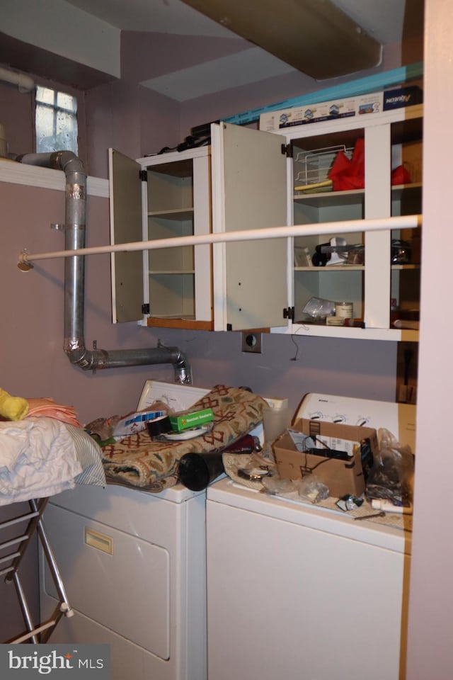 laundry room featuring independent washer and dryer and electric dryer hookup