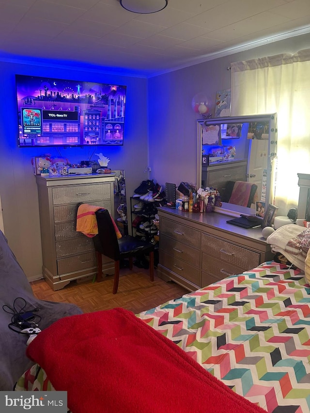 bedroom with parquet flooring