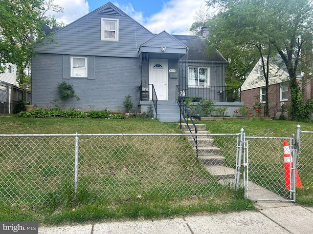 view of front of house with a front lawn