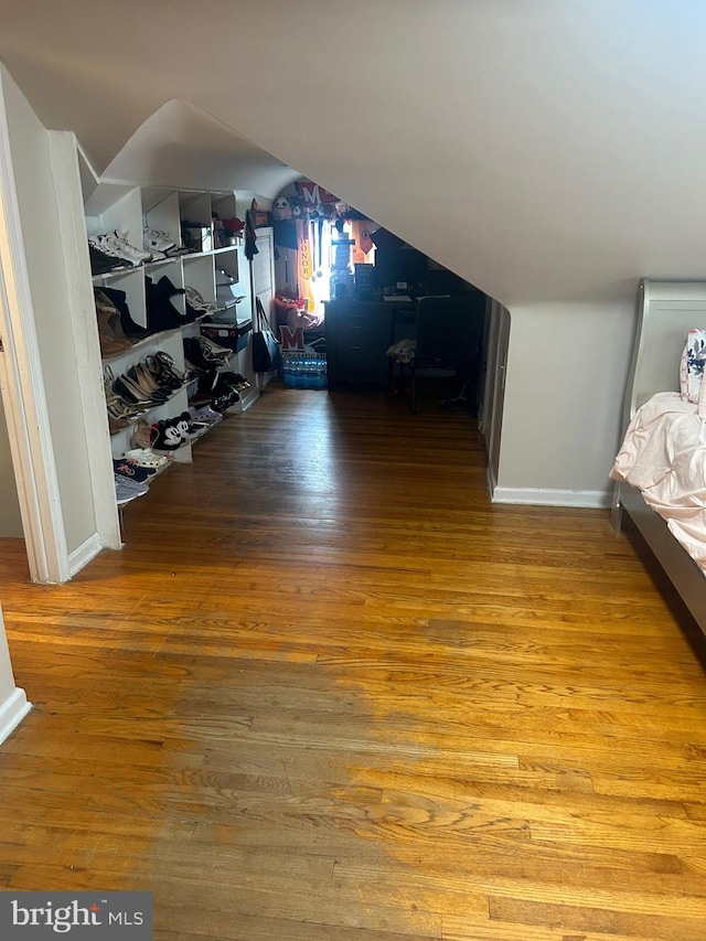 bedroom with hardwood / wood-style floors