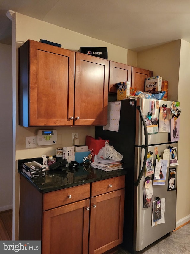 kitchen featuring stainless steel fridge