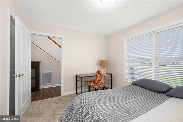 bedroom featuring wood-type flooring