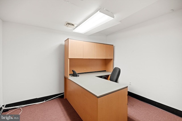 office space with dark carpet