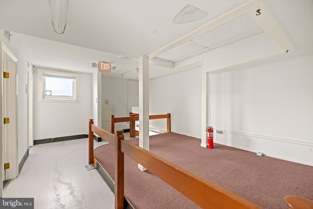 basement featuring tile floors