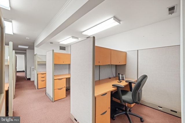 carpeted office with built in desk