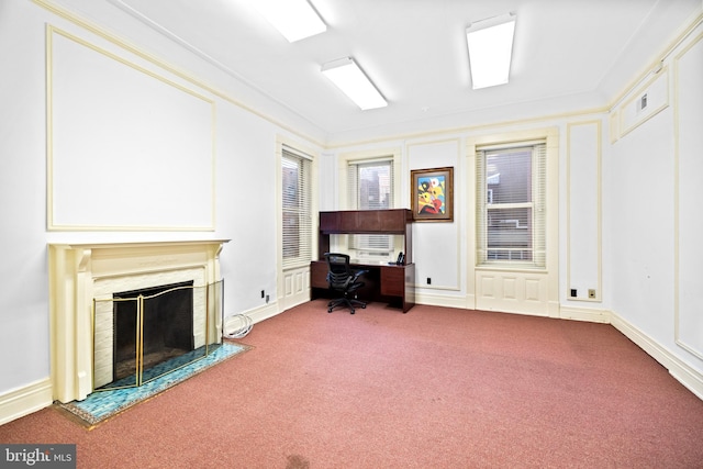 carpeted living room with ornamental molding