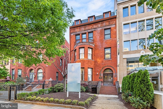 view of building exterior featuring central AC unit