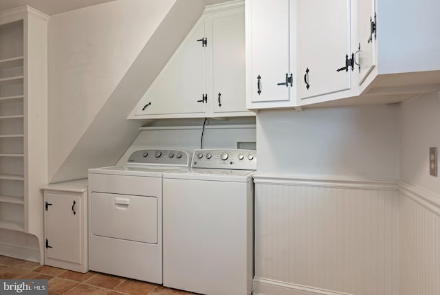 laundry area featuring cabinets and washer and dryer