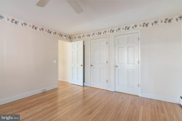 unfurnished bedroom featuring ceiling fan and light hardwood / wood-style floors