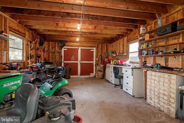 garage with a workshop area