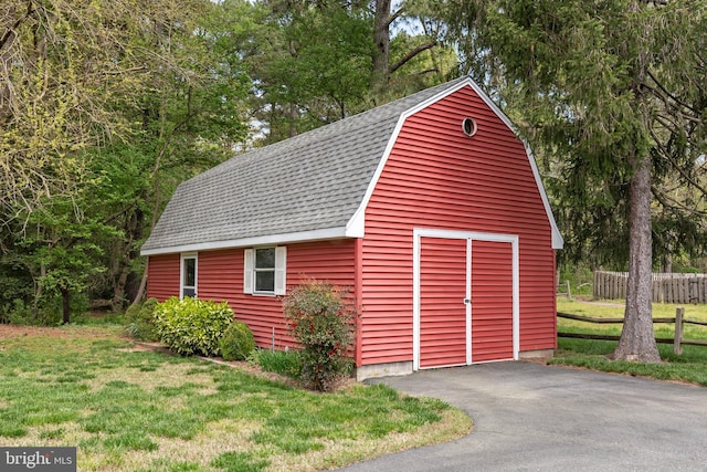 garage with a yard