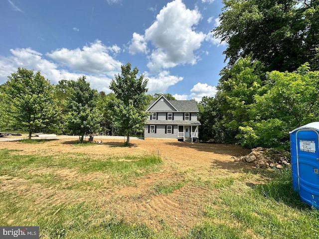 exterior space featuring a front yard