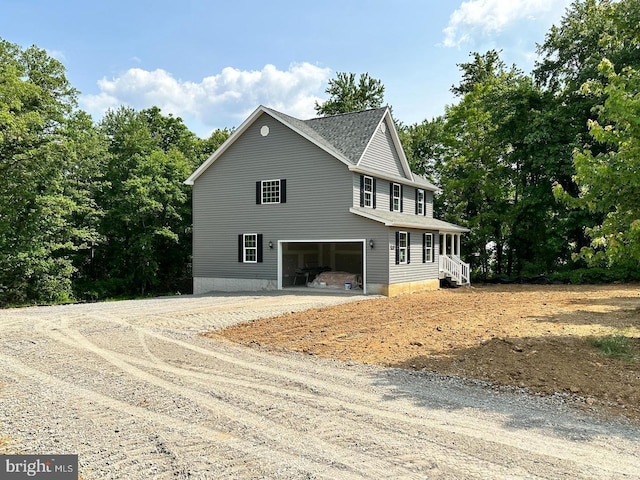 exterior space with an attached garage and driveway