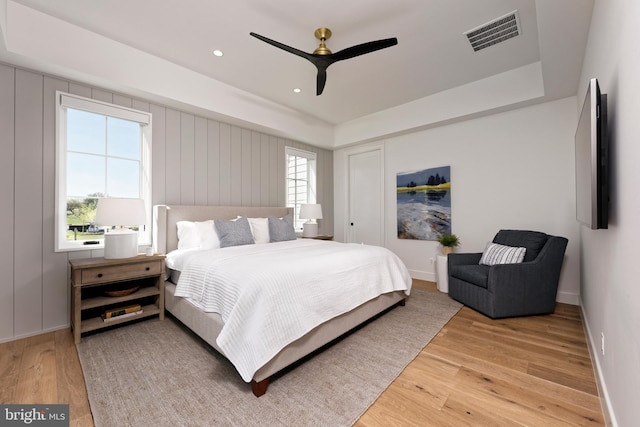 bedroom featuring hardwood / wood-style floors and ceiling fan