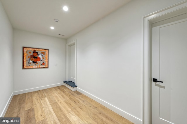 empty room with light wood-type flooring