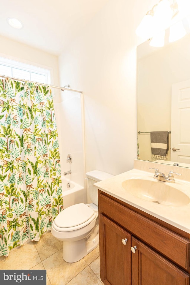 full bathroom featuring tile patterned flooring, vanity, shower / tub combo, and toilet