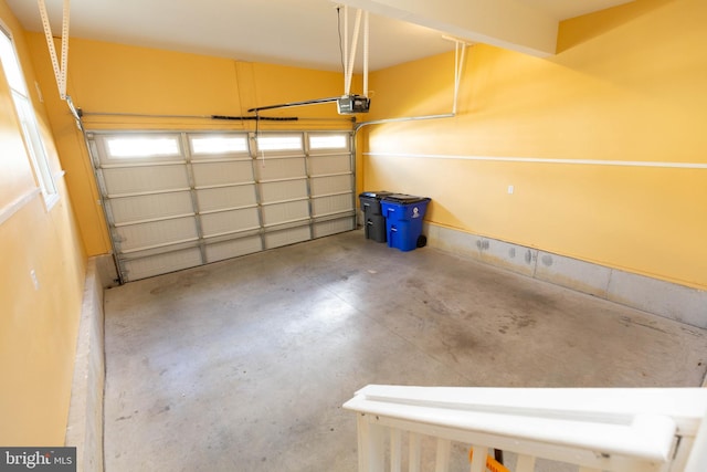 garage featuring a garage door opener