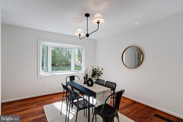 dining room featuring dark wood-type flooring