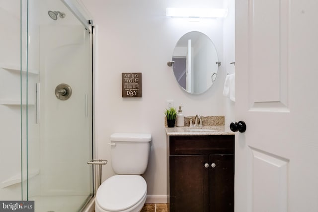 bathroom featuring vanity, toilet, walk in shower, and a wall mounted AC