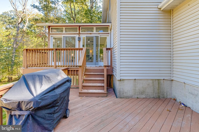 deck with a sunroom